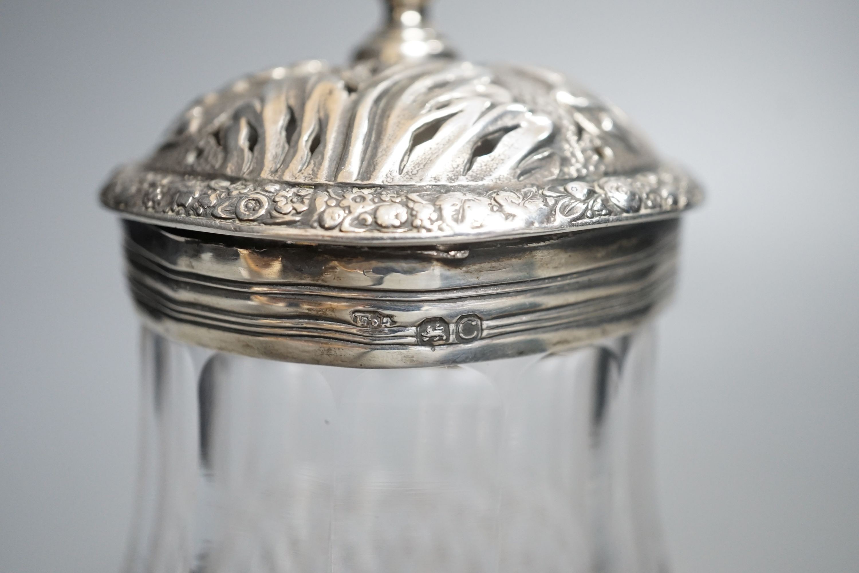 A late George III silver mounted cut glass caster, Edward Farrell, London, 1818, height 16.2cm (split).